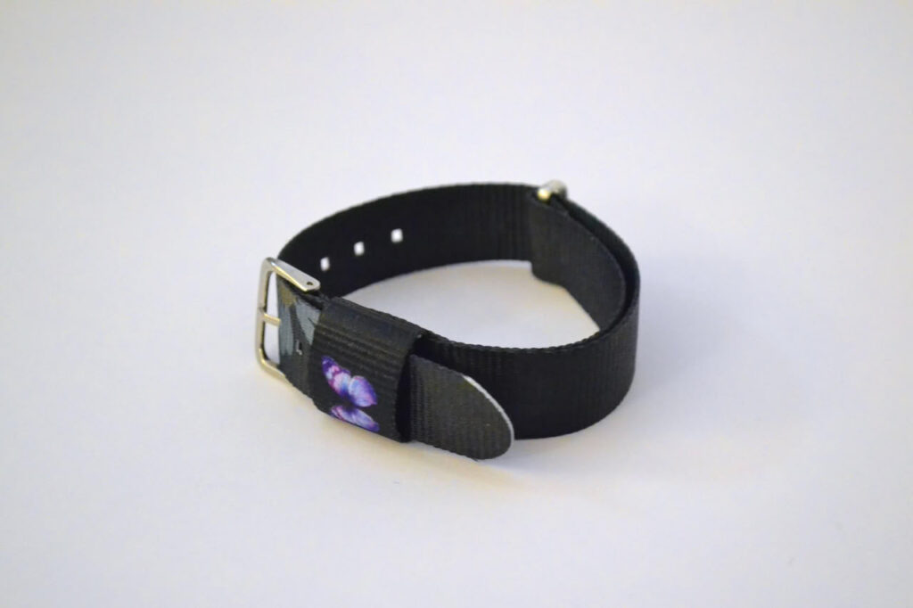 Black Bracelet With Flowers And Butterflies